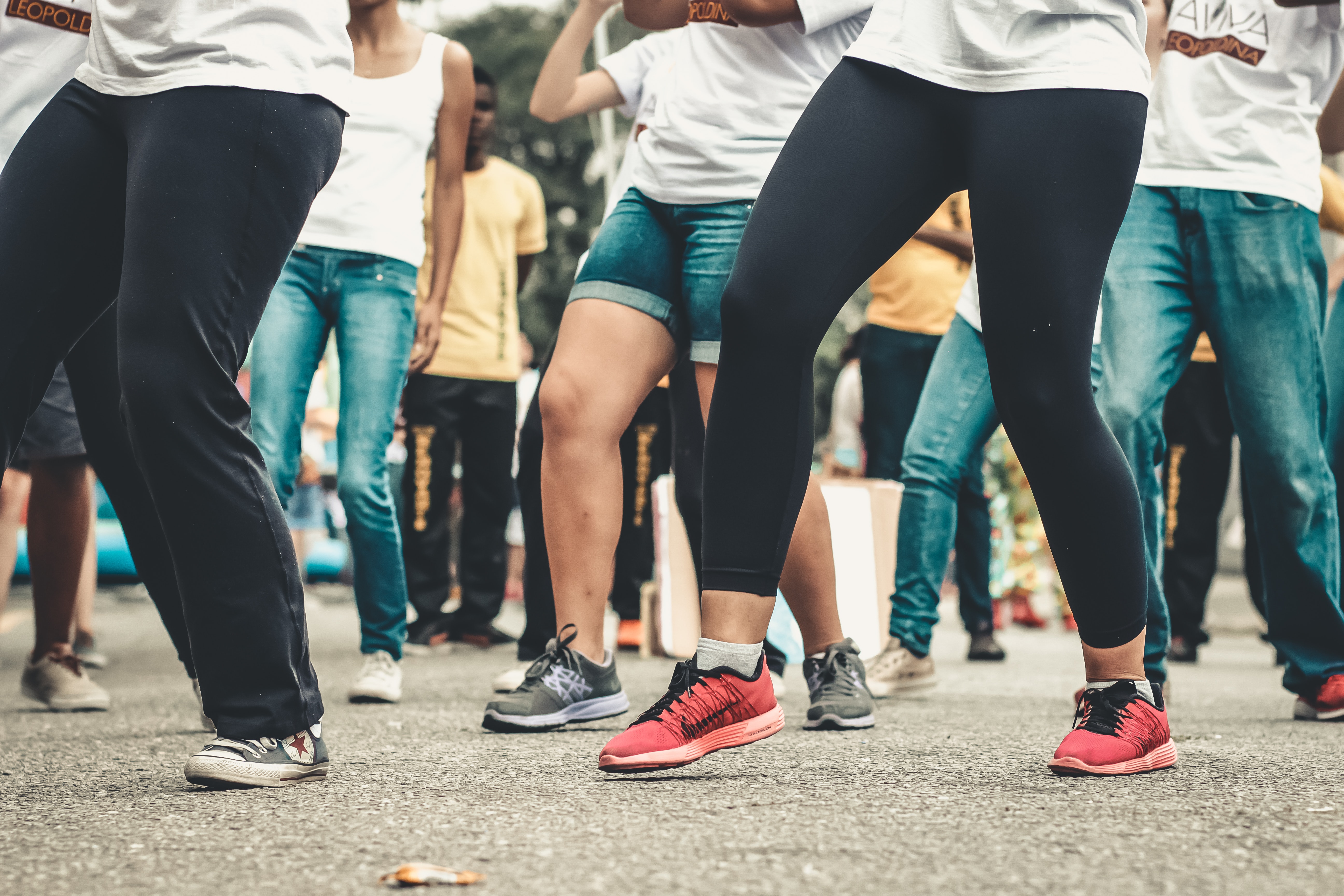 people-dancing-on-concrete-pavement-2061396